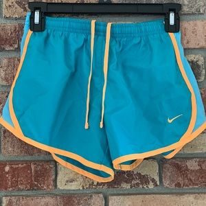 Youth medium teal and orange nike running shorts